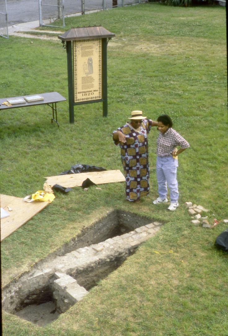 Visitors Look at Foundation of Treme Plantation House