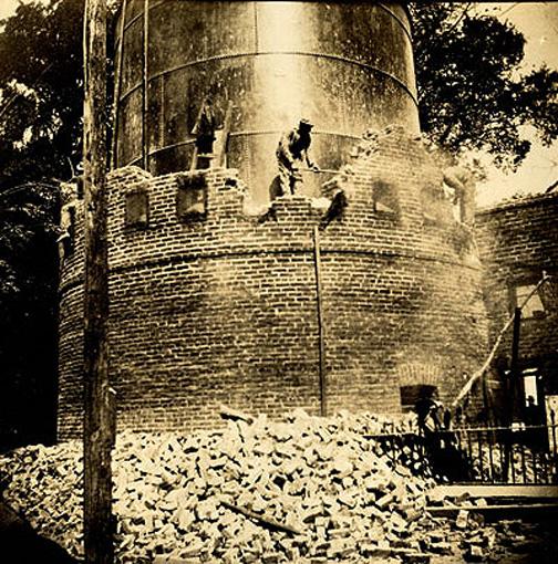 One of the south towers being demolished, circa 1912