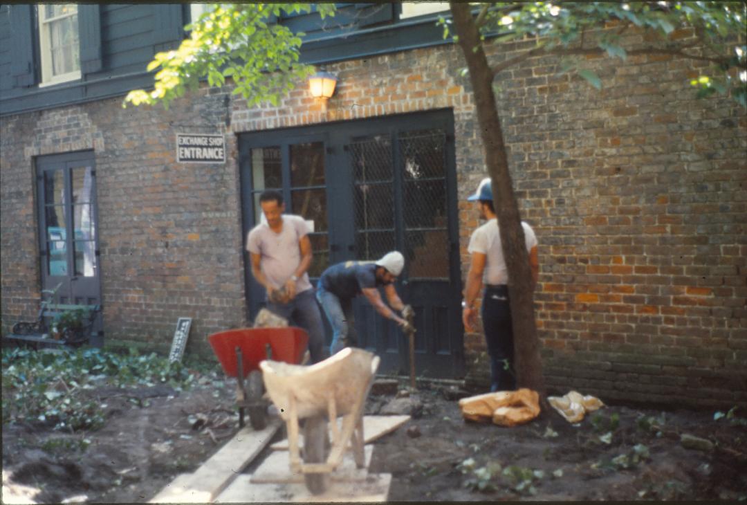Workers in Hermann-Grima Courtyard