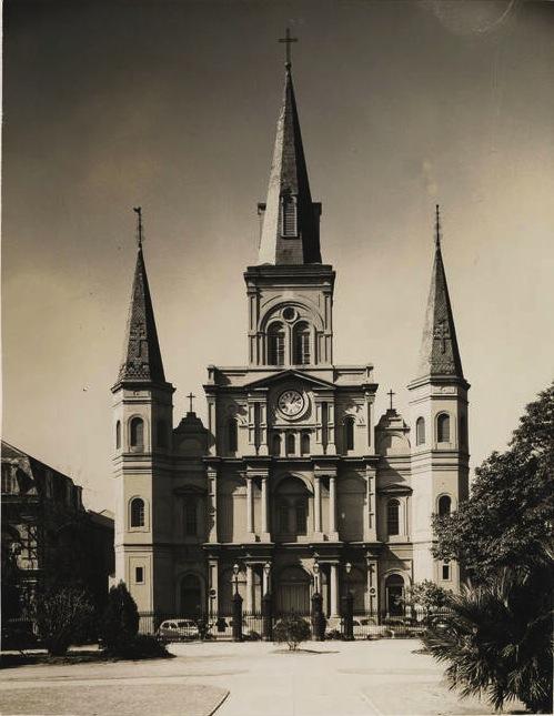 A 1940 image of St. Louis Cathedral with its three steeples viewed from Jackson Square.