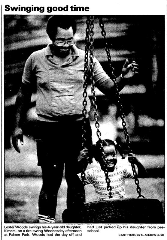 A child playing on a tire swing Palmer Park.